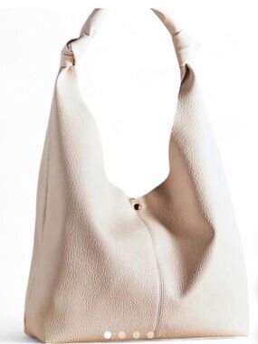 Anthropologie Love Knot Slouchy Bag in Cream